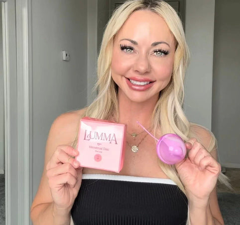 A customer proudly displaying the brand of her chosen menstrual disc