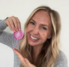Women holding a Lumma Reusable Menstrual Disc