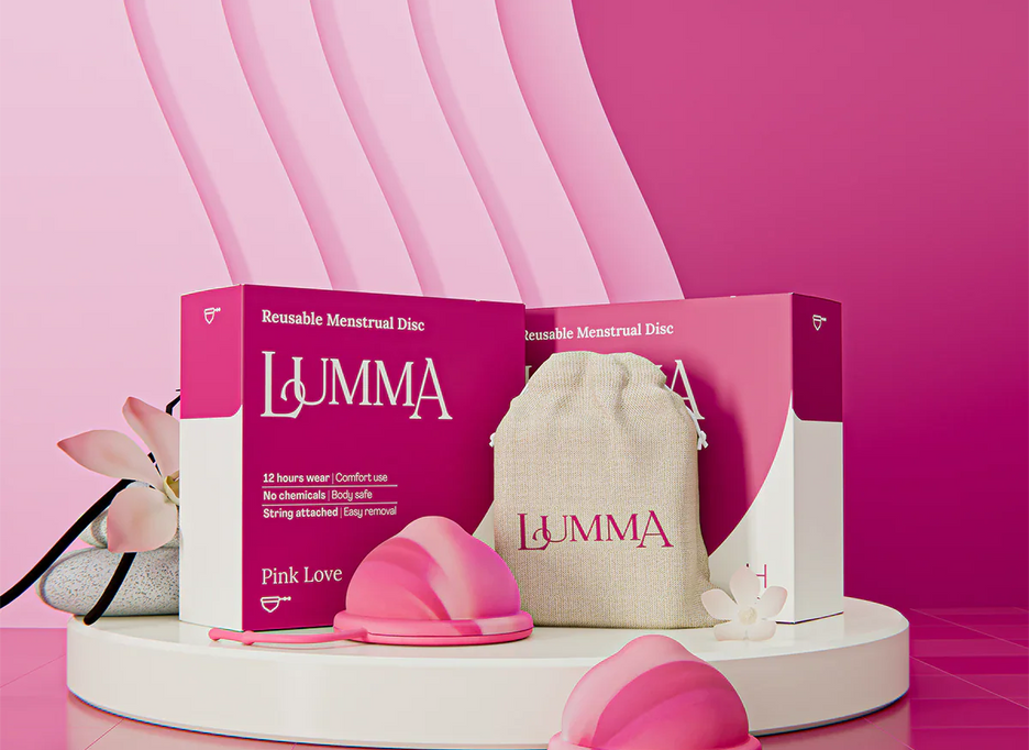 Lumma reusable menstrual disc in the pink love color with packaging and pouch