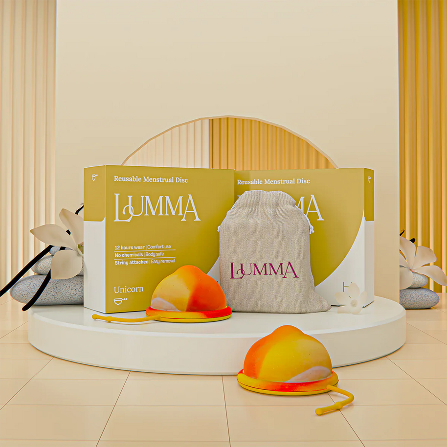 Lumma reusable menstrual disc in the unicorn color with packaging and pouch