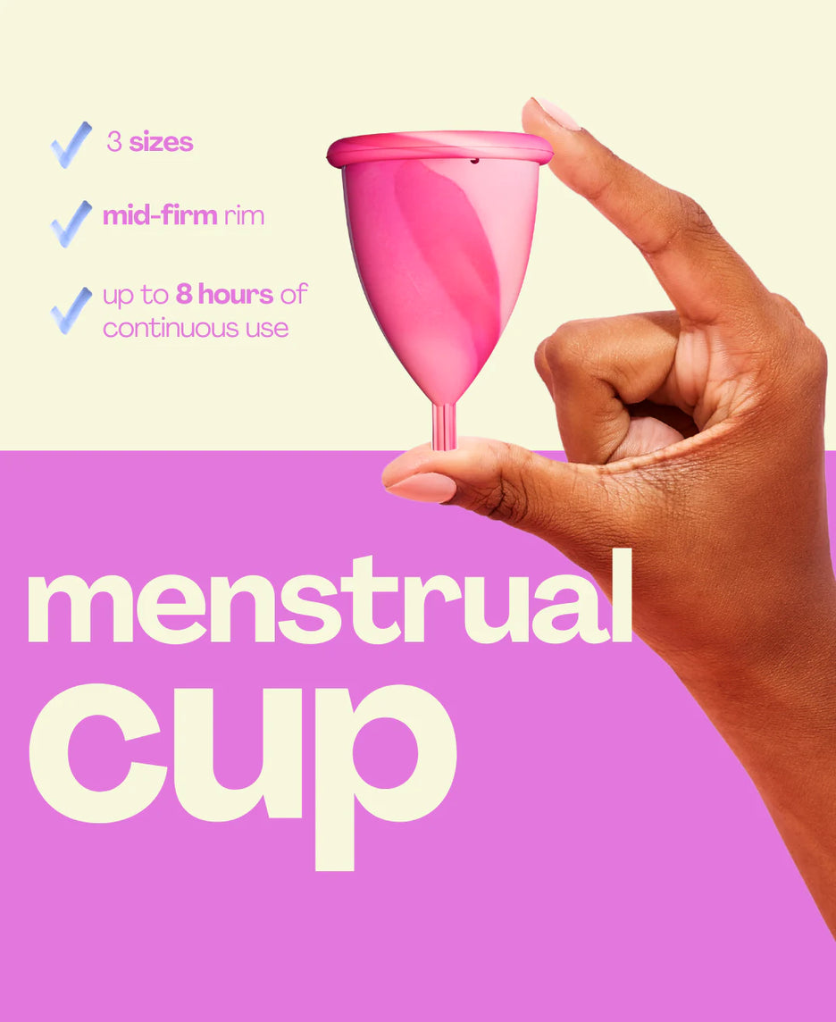 Menstrual cup with hand holding it against a pink background and text details about features